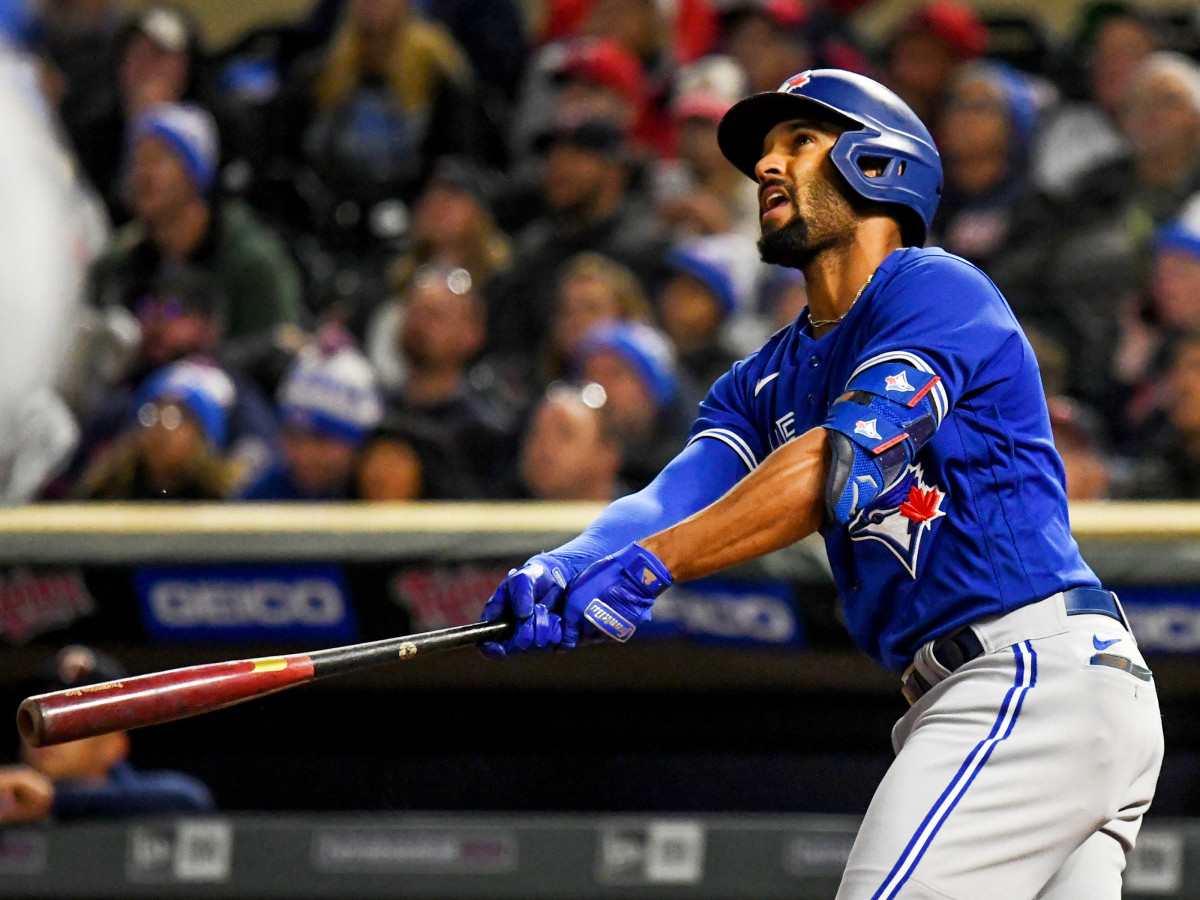Sep 24, 2021; Minneapolis, Minnesota, USA;  Toronto Blue Jays infielder Marcus Semien (10) makes contact against the Minnesota Twins at Target Field.